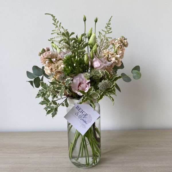 Fresh flowers in Ipswich arranged in jam jar for for perfect gift. Pink and green arrangement includes stocks, lisanthus, astilbe, astrantia